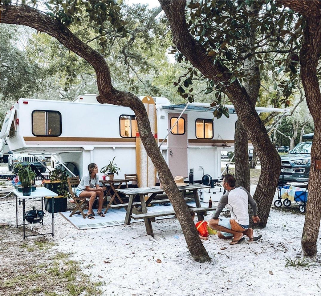 Shady campsites under oak trees